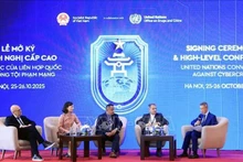 题为 “联合国公约：主权保障与多边主义的支柱”的专题讨论会在河内举行。（图片来源：越通社）