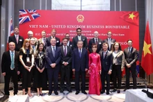 苏林总书记和各位代表合影。(图片来源:越通社)