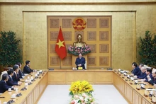 越南政府总理范明正会见日本企业家代表团现场。（图片来源：越通社）