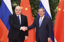 11月3日，中国国务院总理李强在中国杭州同俄罗斯总理米舒斯京共同主持中俄总理第三十次定期会晤。图片来源：新华社