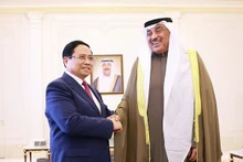 越南政府总理范明正会见科威特王储谢赫萨巴赫·哈立德·萨巴赫。（图片来源：VGP）