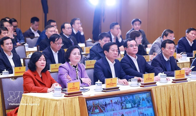 出席启动仪式的代表。（图片来源：越通社）