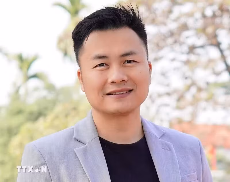 越南澳大利亚知识分子和专家协会新南威尔士州分会主席、人工智能专家、ANSCENTER公司创始人兼首席执行官阮俊义。（图片来源：越通社）
