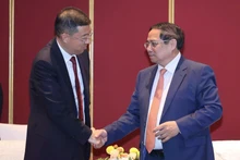 范明正总理会见中国银行（BOC）董事长葛海蛟。