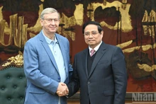 越南政府总理范明正会见俄罗斯系统金融股份公司董事长【组图】