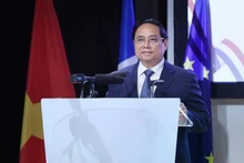 越南政府总理范明正出席越法企业论坛。