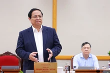 范明正总理在会上发表讲话。（图片来源：越通社）