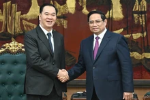 范明正总理会见老挝教育体育部长通沙立·芒诺梅【组图】