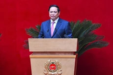 越南政府总理范明正在活动上发表讲话。