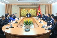 会见场景。（图片来源：baotintuc.vn）