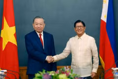 越共中央总书记、国家主席苏林与菲律宾总统费迪南德·罗慕尔德兹·马科斯。（图片来源：越通社）