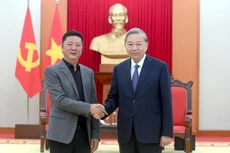 越共中央总书记苏林会见中国立讯精密副董事长王来胜。登科 摄