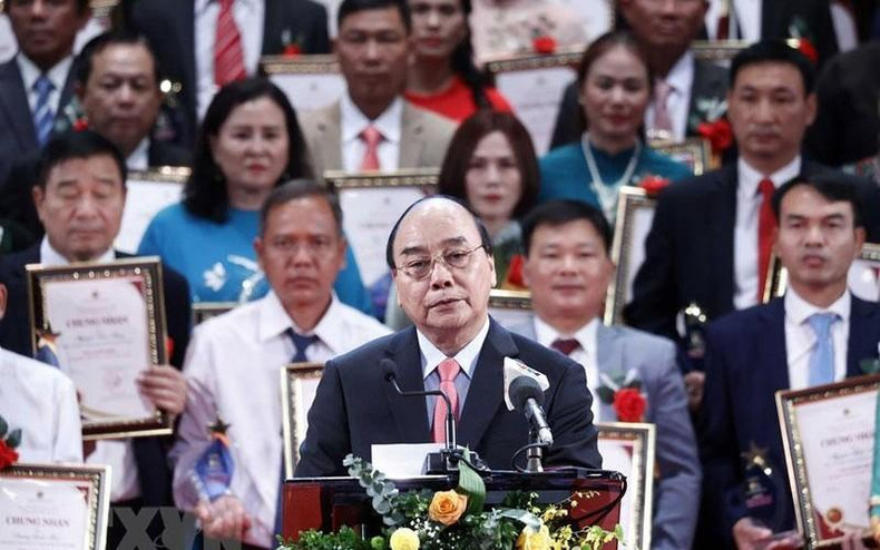 阮春福主席在表彰大会上发表讲话。(图片来源:越通社) 阮春福主席在表彰大会上发表讲话。(图片来源:越通社)