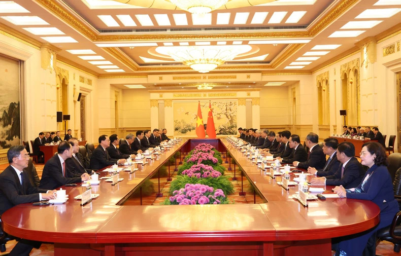 越共中央总书记、国家主席苏林会见中国全国政协主席王沪宁。（图片来源：越通社）