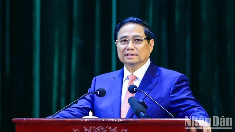 范明正总理在会上发表讲话。 范明正总理在会上发表讲话。