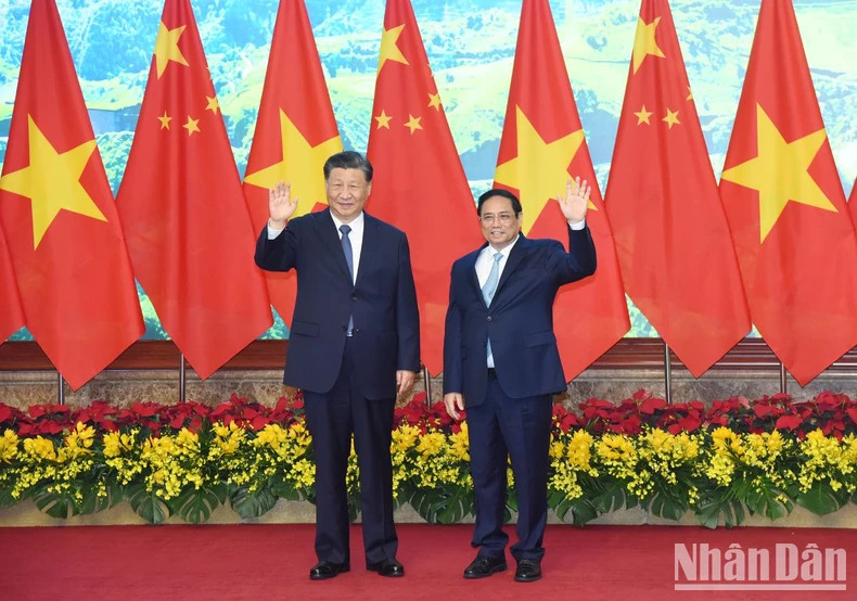 越南政府总理范明正和中共中央总书记、中国国家主席习近平合影。 越南政府总理范明正和中共中央总书记、中国国家主席习近平合影。