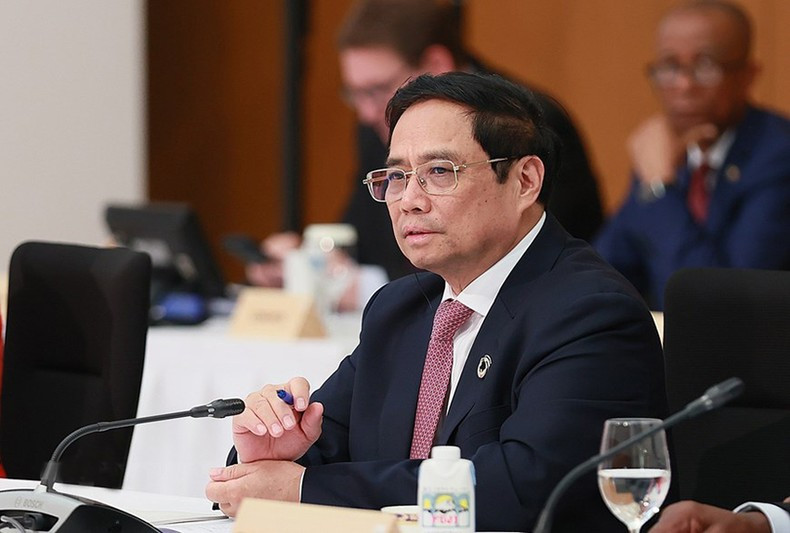范明正总理出席讨论会。 范明正总理出席讨论会。