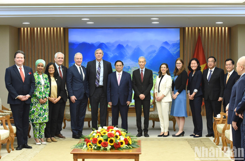 双方代表合影留念。