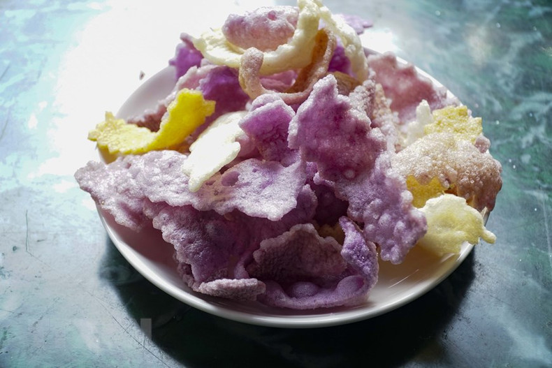 奠边省芒莱市白泰人独特的切饼。 奠边省芒莱市白泰人独特的切饼。