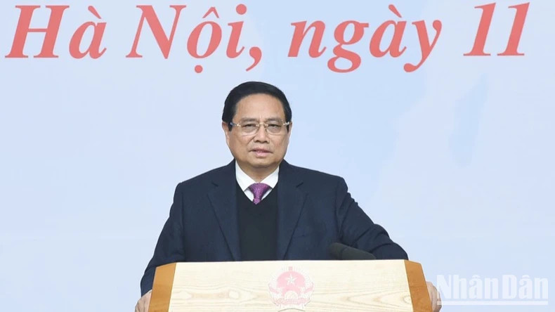 范明正总理在会上发表讲话。