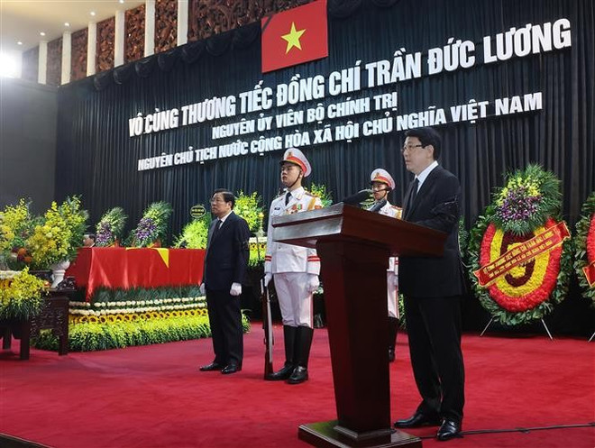 国家主席梁强致悼词。(图片来源:越通社) 国家主席梁强致悼词。(图片来源:越通社)