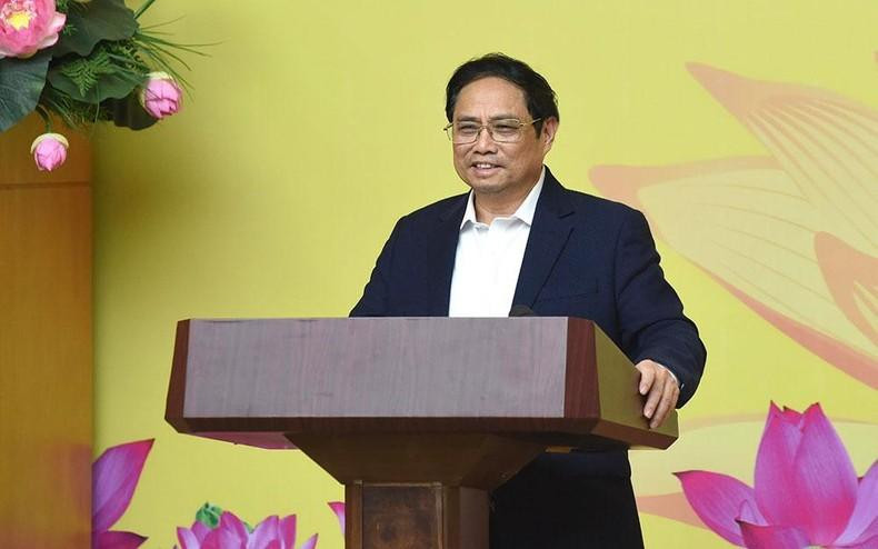 范明正总理在会上发言。 范明正总理在会上发言。