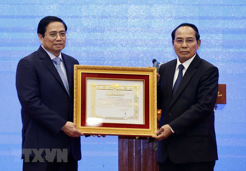 越南高层领导荣获老挝国家崇高勋章(组图) ảnh 6 越南高层领导荣获老挝国家崇高勋章(组图) ảnh 6