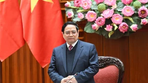 政府总理、宏观经济调控指导委员会主任范明正主持召开委员会第二次会议。（陈海 摄）