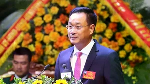 越共中央委员、岘港市委书记、市党委代表团团长黎玉光同志。（图片来源：越通社）