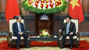 越南国家主席梁强会见中国全国人大委员长赵乐际。