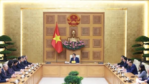 越南政府总理范明正会见中国山东省委书记林武。