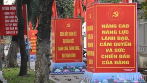 附图：越共十四大宣传海报。