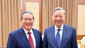 越共中央总书记苏林会见中国国务院总理李强。（图片来源：越通社）