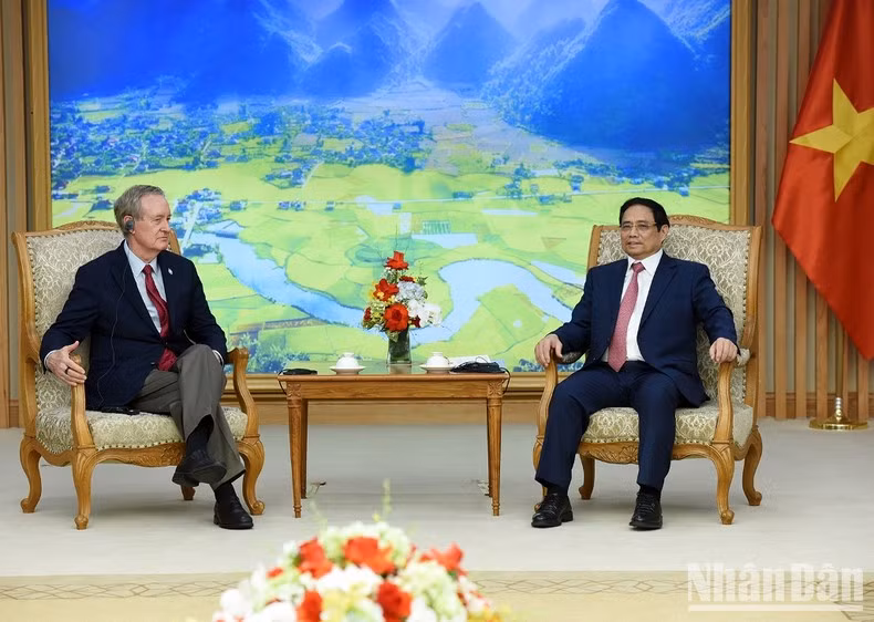 越南政府总理范明正会见美国参议员迈克·克雷波【组图】 ảnh 3