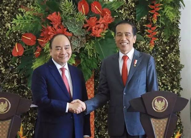 越南国家主席阮春福与印尼总统佐科·维多多。