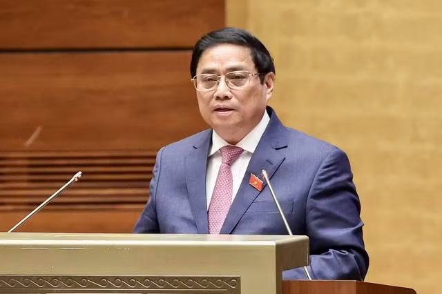 范明正总理在会上发表讲话。