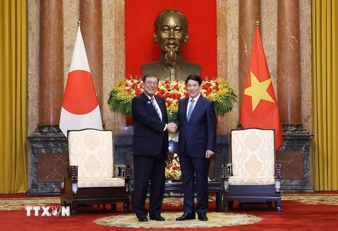 越南国家主席梁强会见日本首相石破茂。（图片来源：越通社）