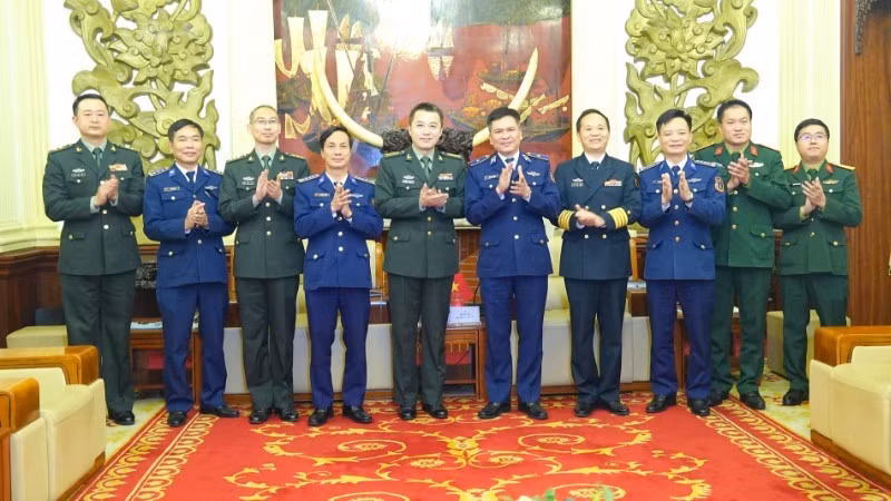 双方代表合影。