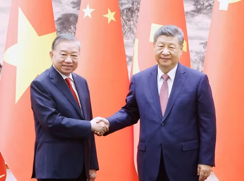越南共产党中央委员会总书记、越南社会主义共和国主席苏林与中国共产党中央委员会总书记、中华人民共和国主席习近平。