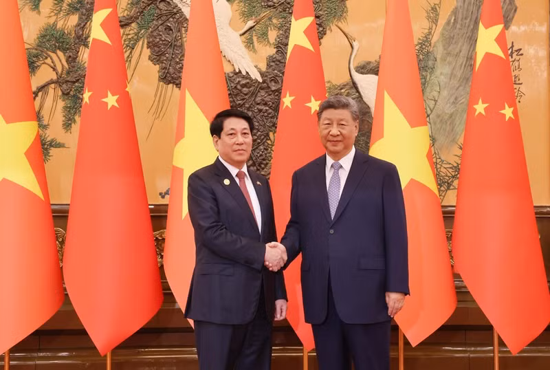 越南国家主席梁强与中共中央总书记、中国国家主席习近平。（图片来源：越通社）