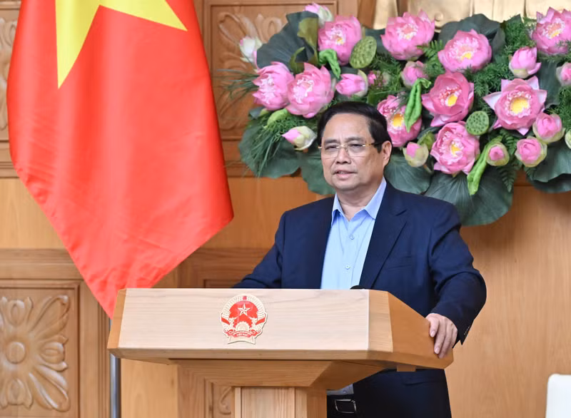范明正总理在会上发表讲话。