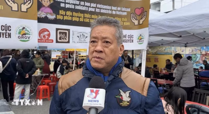 法国越南企业家协会主席阮海南接受越通社记者采访。（图片来源：越通社）