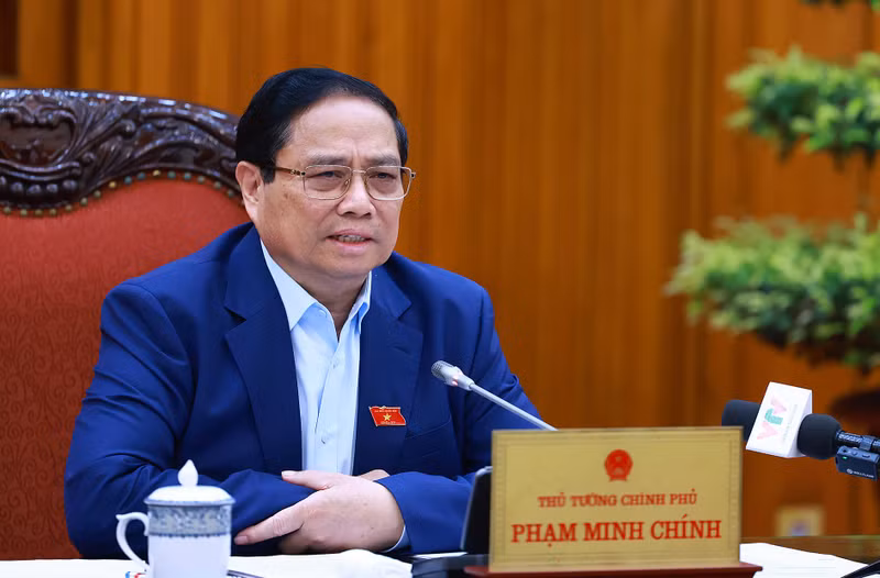 范明正总理在会上发表讲话。