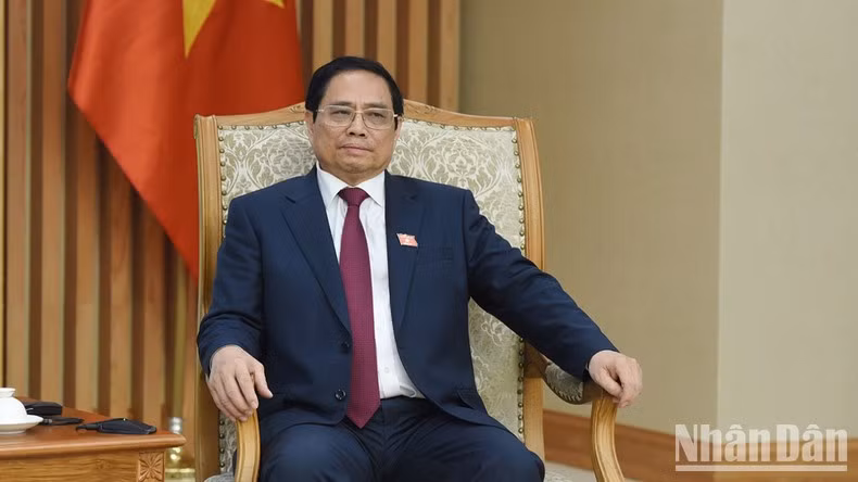 范明正总理在会见中发表讲话。