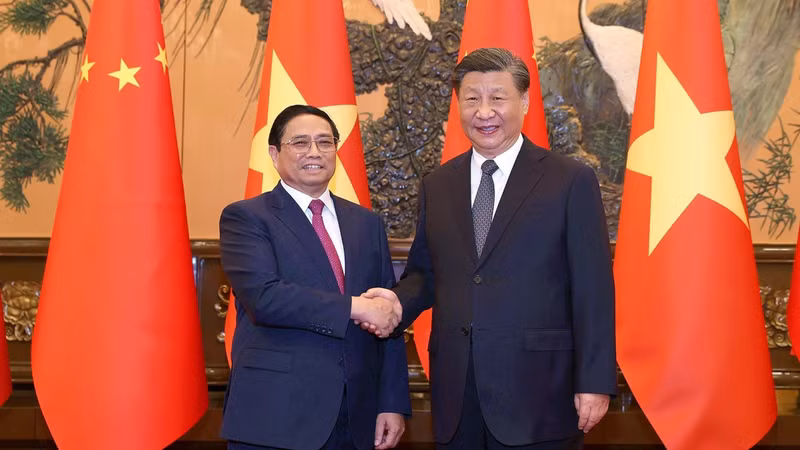 越南政府总理范明正会见中共中央总书记、中国国家主席习近平。