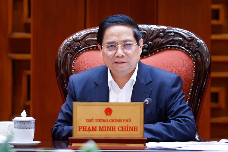 越南政府总理范明正发表讲话。（图片来源：VGP）