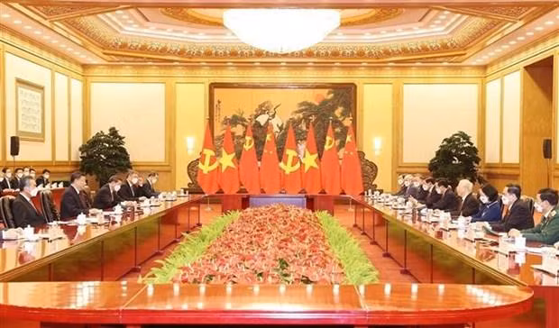 越共中央总书记阮富仲同中共中央总书记、中国国家主席习近平举行会谈。（图片来源：越通社）