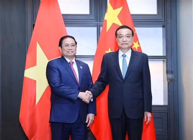 范明正总理会见中国国务院总理李克强。（图片来源：越通社）