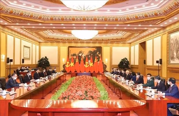 越共中央总书记阮富仲与中共中央总书记、中国国家主席习近平举行会谈。（图片来源：越通社）
