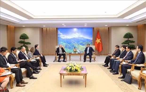 政府总理范明正会见美国—东盟商业委员会和美国企业代表。（图片来源：越通社）
